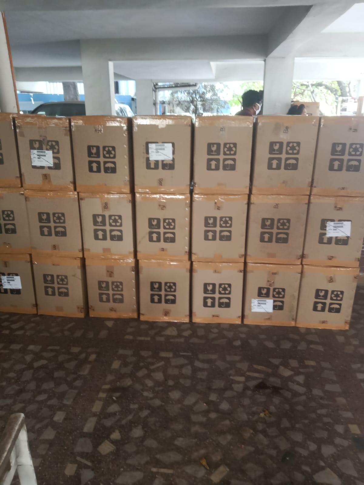 Stacked packed cartons ready for loading